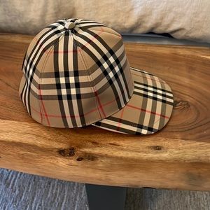 Brand new Burberry baseball hat. Never worn. Medium